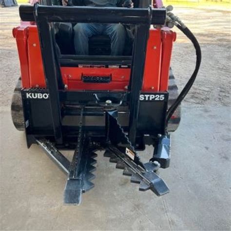 is a skid steer or tractor better|tree puller for skid steer.